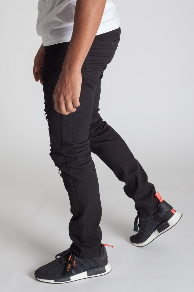 KDNK Patched and Distressed Skinny Jeans